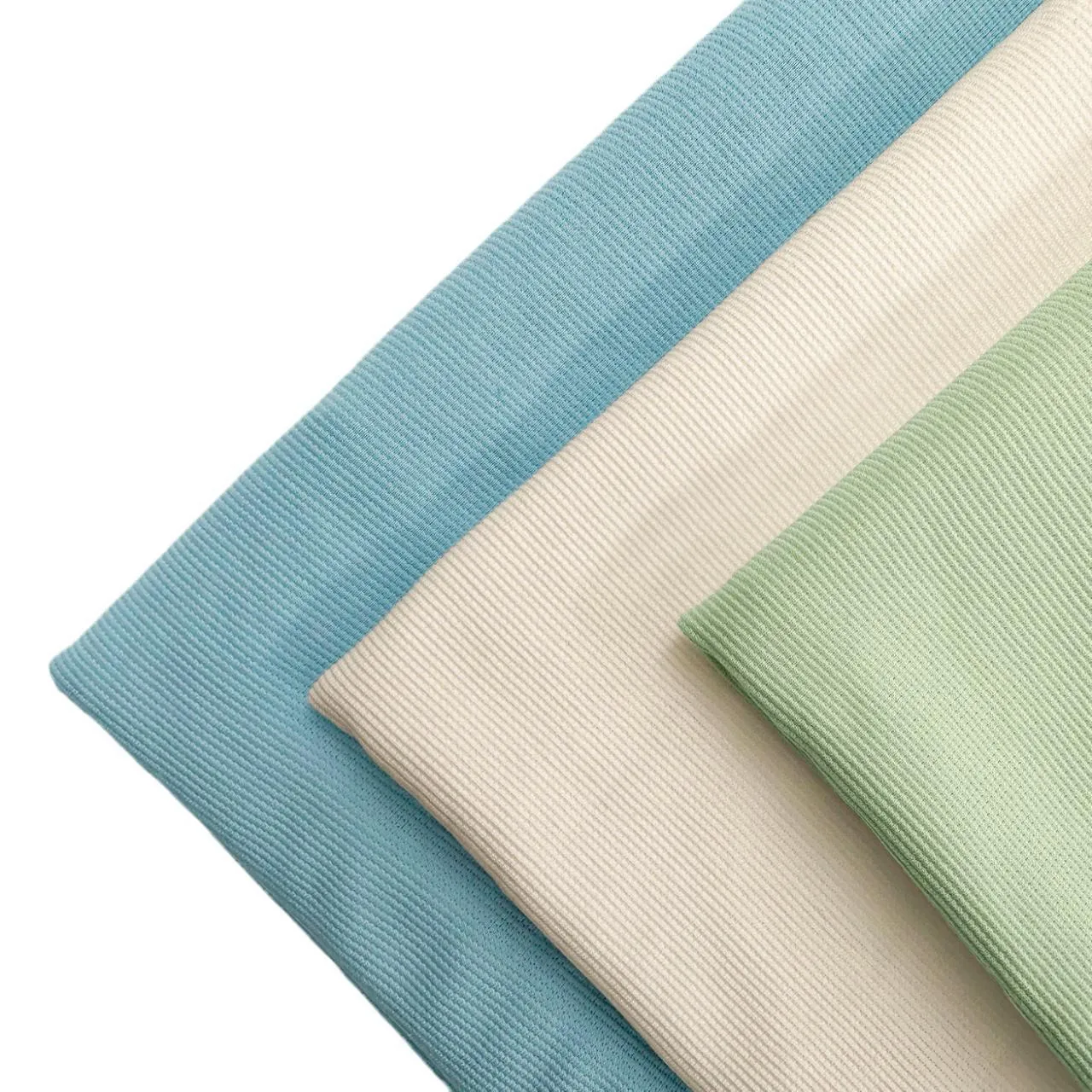 Folded knit fabric in blue, ivory and sage