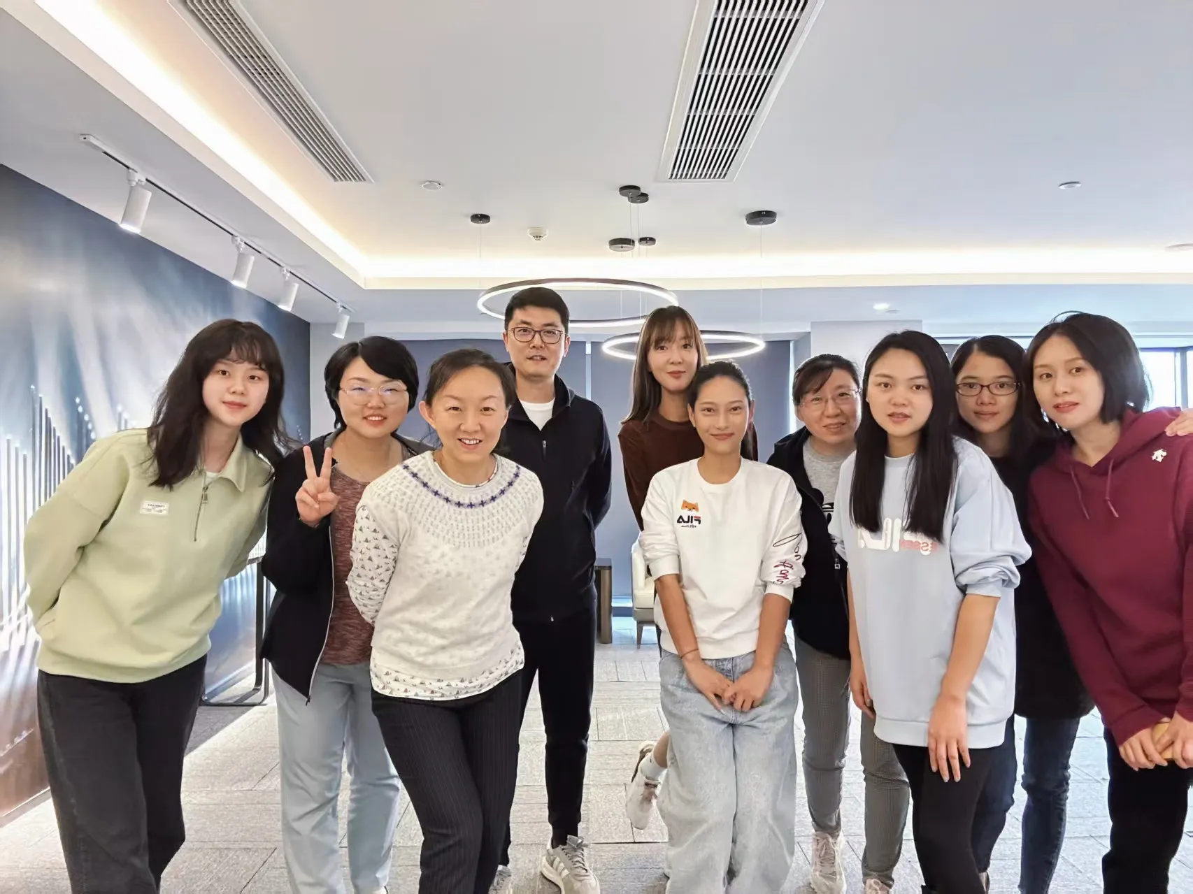 The Rongchang Fabric team gathered in the company office
